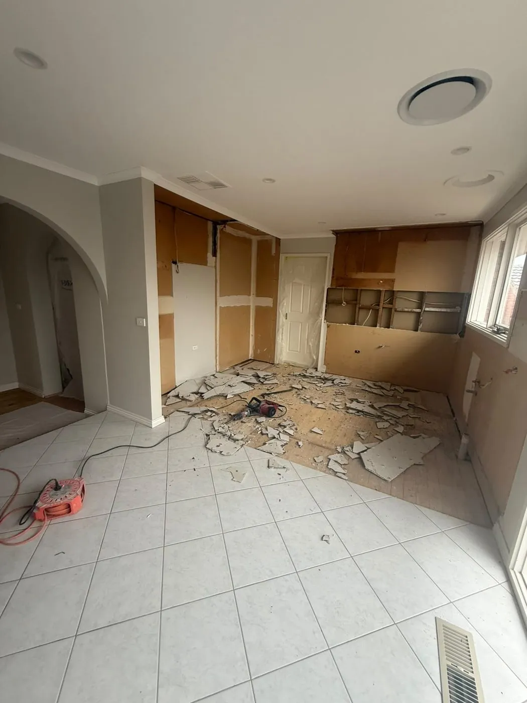 Kitchen stripped out ready for new tiling and cabinetry