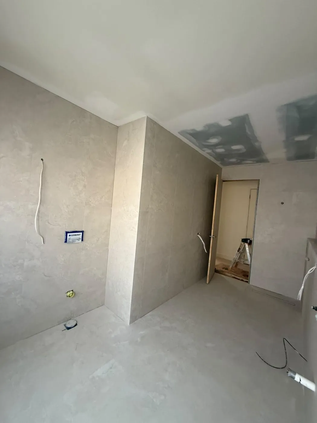 Bathroom walls sheeted and prepared for wall tiling